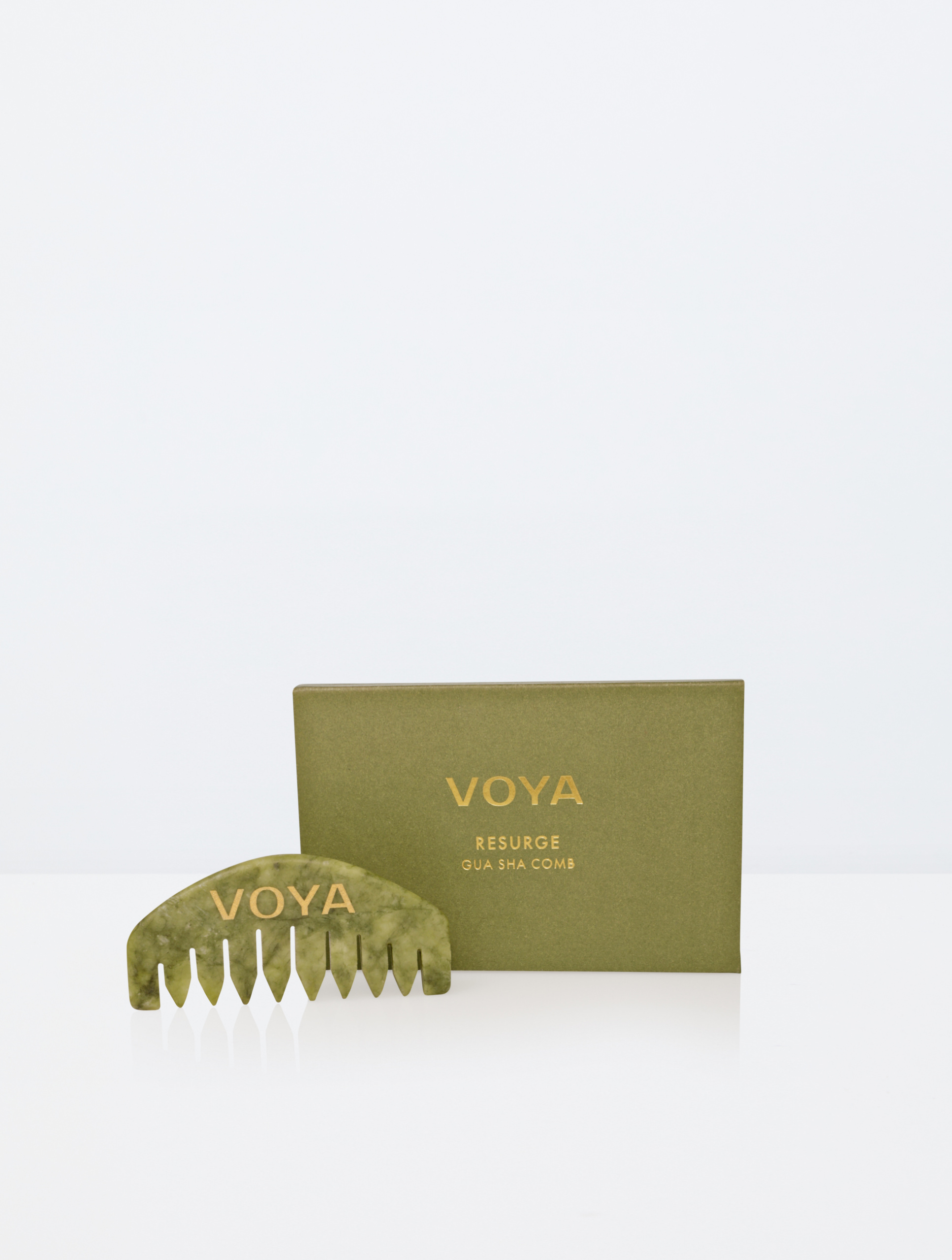 picture of OYA Resurge Gua Sha Comb on white background